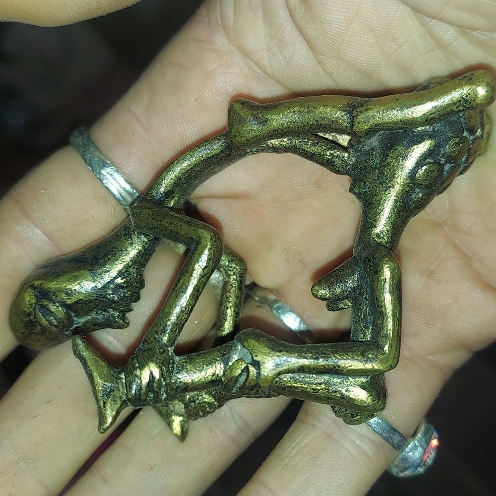 Vintage erotic brass sculpture